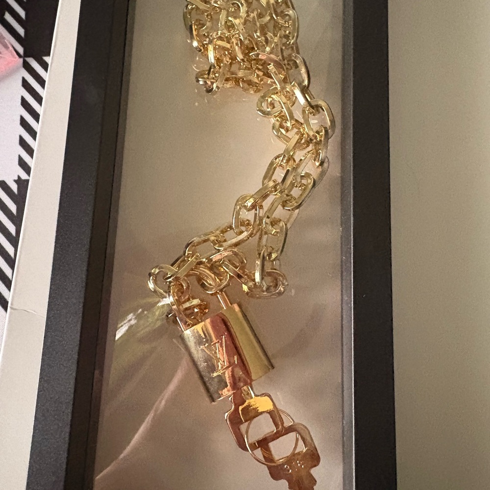 LV Padlock #318 on Gold plated chain